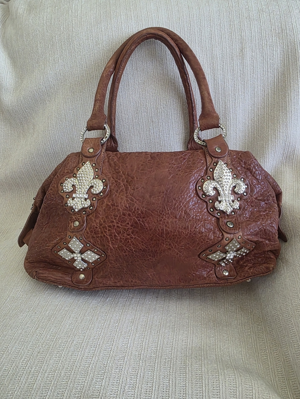 Embellished Brown Leather Shoulder Bag with Fleur-de-Lis Accents